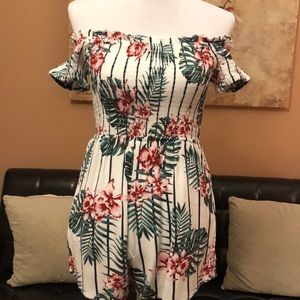 Floral off the shoulder romper.